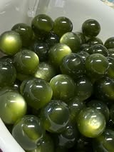 16mm mica cats eye resin bead.