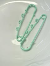 Charm safety pins