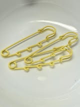 Charm safety pins