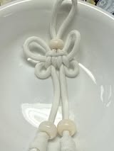 8.5” tied rope charms