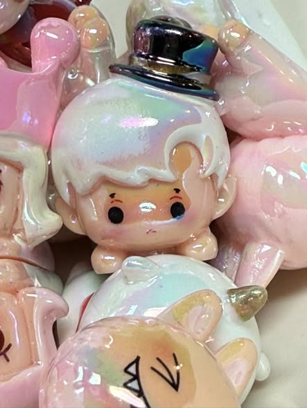 A fun mix of top quality UV coated popmart character beads