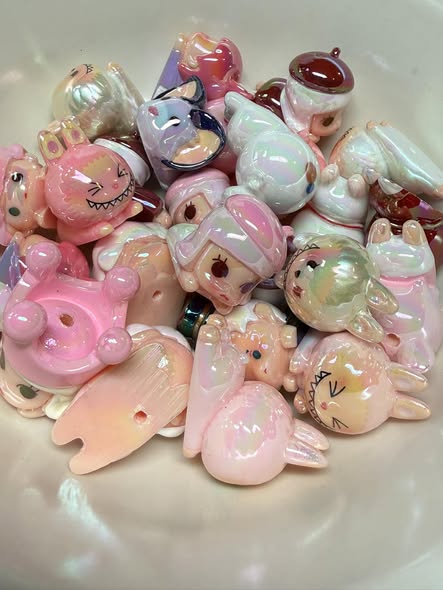 A fun mix of top quality UV coated popmart character beads