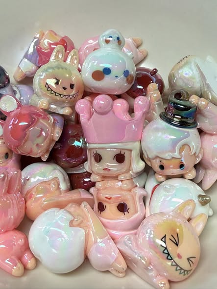 A fun mix of top quality UV coated popmart character beads