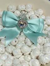 60mm satin bow with large gem heart a sugar bead with a stunning crown.