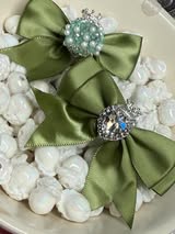 60mm satin bow with large gem heart a sugar bead with a stunning crown.