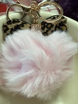 3" Fuffy pompom with chain and lobster claw hardware.