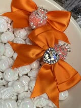 60mm satin bow with large gem heart a sugar bead with a stunning crown.