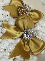 60mm satin bow with large gem heart a sugar bead with a stunning crown.