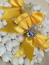 60mm satin bow with large gem heart a sugar bead with a stunning crown.