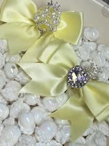 60mm satin bow with large gem heart a sugar bead with a stunning crown.