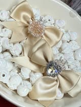 60mm satin bow with large gem heart a sugar bead with a stunning crown.