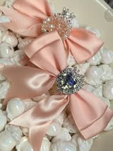 60mm satin bow with large gem heart a sugar bead with a stunning crown.