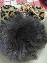 3" Fuffy pompom with chain and lobster claw hardware.