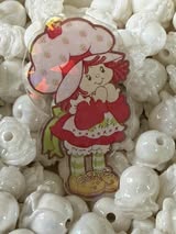 Badge reel acrylic flatbacks Lisa Frank, Sesame Street, Strawberry Shortcake, My little pony, Rainbow bright, Power Puff Girl, Care Bears, and Pooh