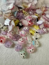 1.2cm Sanrio family nail charms.