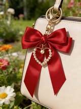 Satin bow with metal and pearl heart purse bow