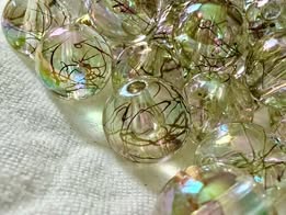 16mm swirls of gold bead