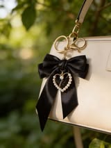 Satin bow with metal and pearl heart purse bow