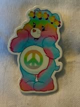 Badge reel acrylic flatbacks Lisa Frank, Sesame Street, Strawberry Shortcake, My little pony, Rainbow bright, Power Puff Girl, Care Bears, and Pooh