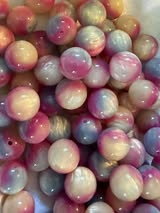 16mm cats eye resin bead.