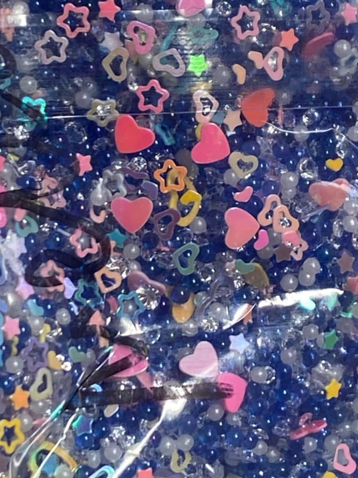 Acrylic sugar crystals for decorating your own pens,fancy beads, journal pages. Hair bands and so much more. Try using it on a bookmark!