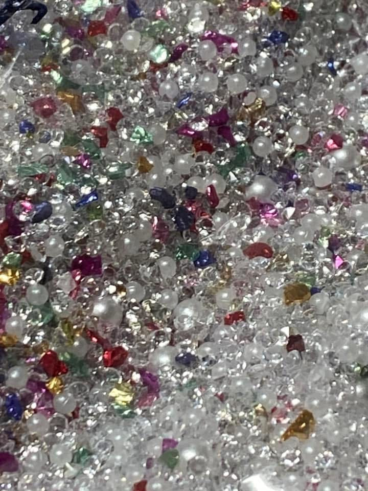 Acrylic sugar crystals for decorating your own pens,fancy beads, journal pages. Hair bands and so much more. Try using it on a bookmark!