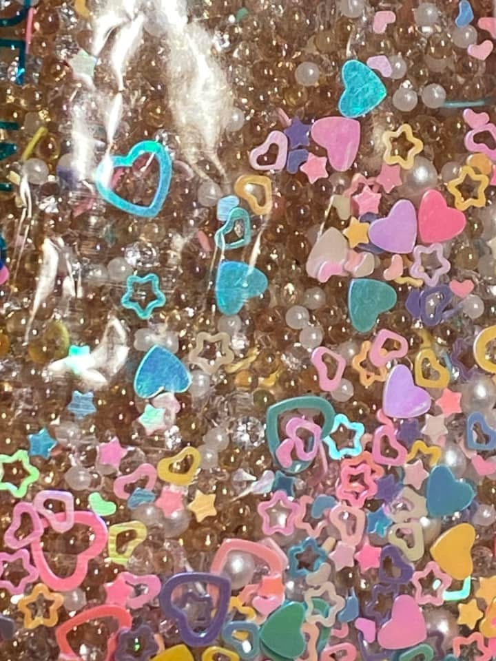 Acrylic sugar crystals for decorating your own pens,fancy beads, journal pages. Hair bands and so much more. Try using it on a bookmark!