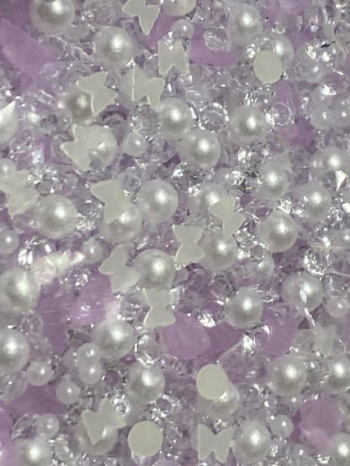 Acrylic sugar crystals for decorating your own pens,fancy beads, journal pages. Hair bands and so much more. Try using it on a bookmark!