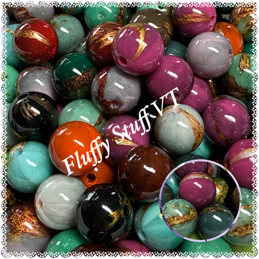 16mm mixed marble blend with vintage gold swatches.