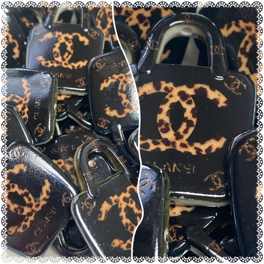50mm CC purse bead with animal print.