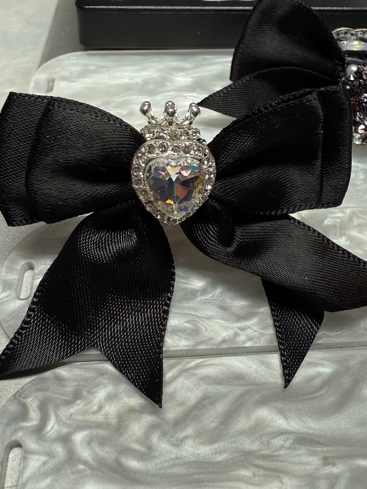 60mm satin bow with large gem heart a sugar bead with a stunning crown.