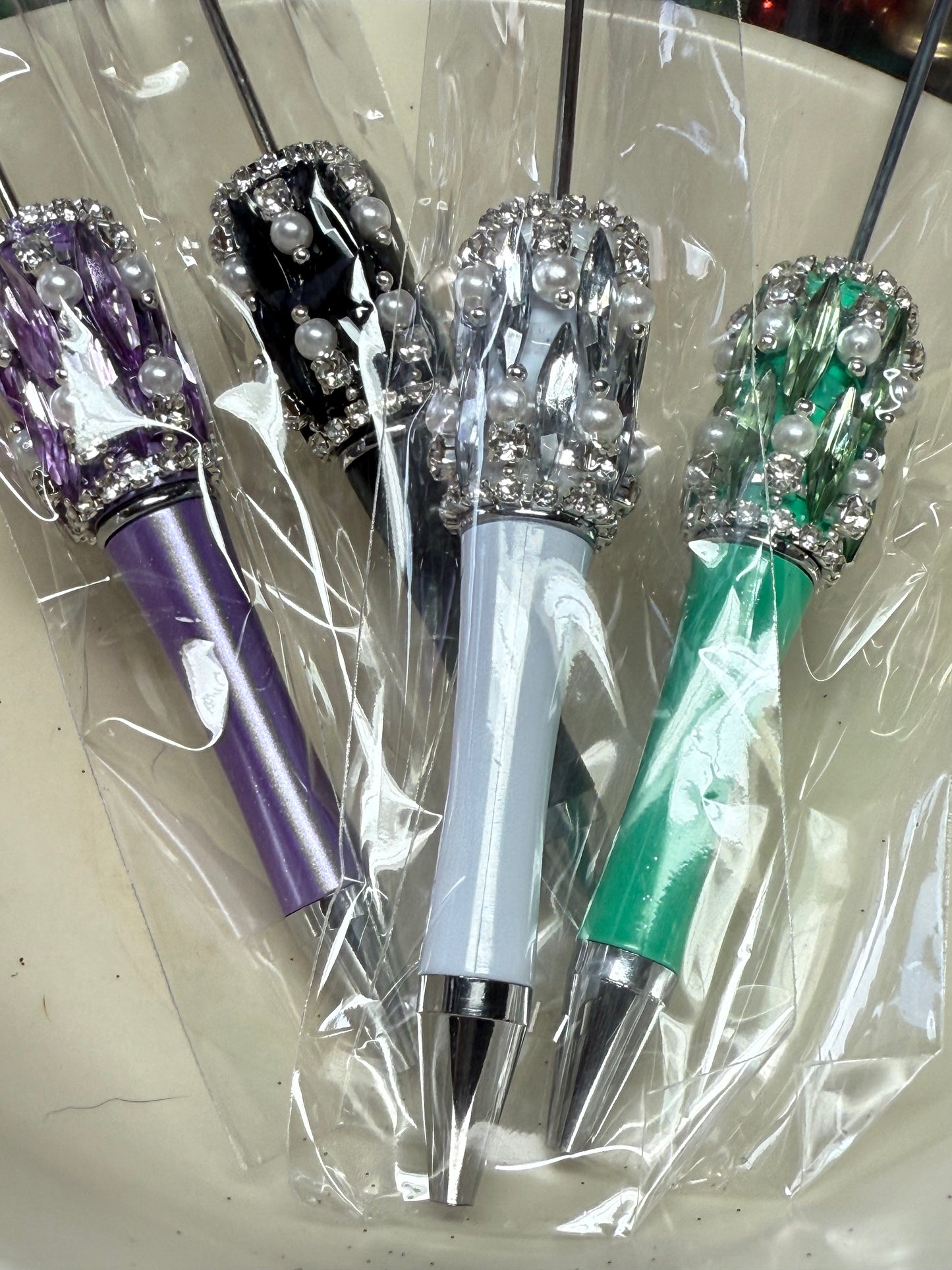 Highly decorated rhinestone, pearl and gem wrapped pens