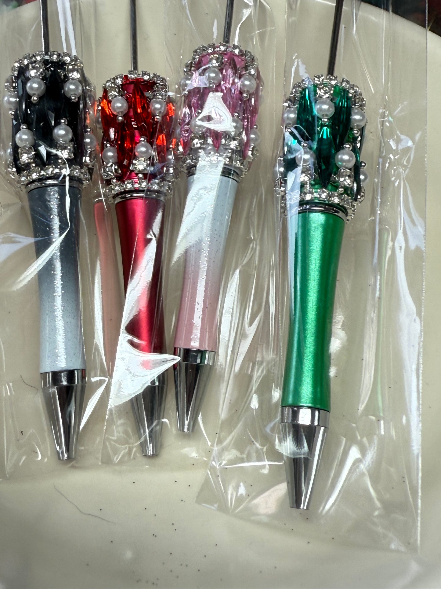 Highly decorated rhinestone, pearl and gem wrapped pens