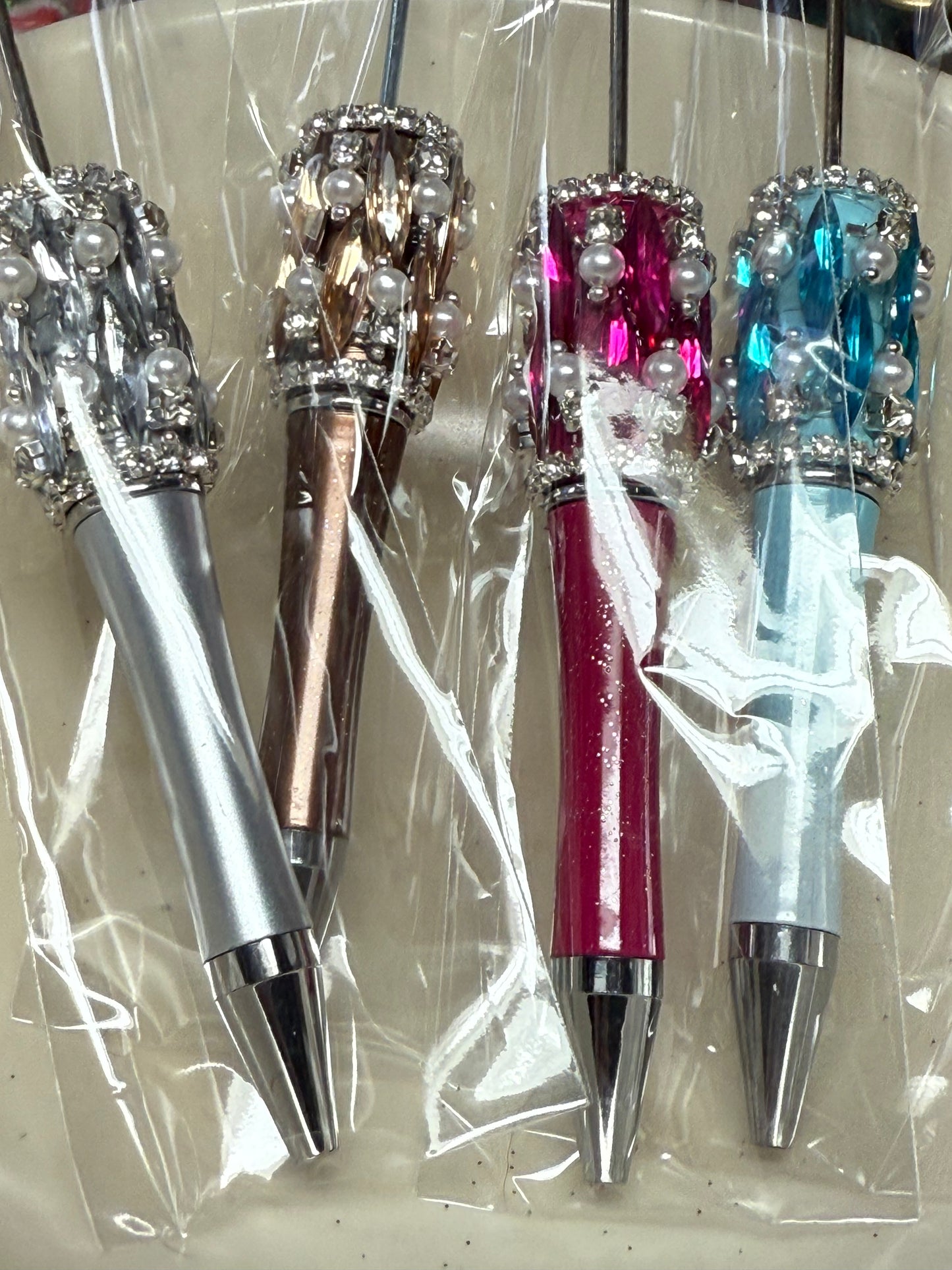 Highly decorated rhinestone, pearl and gem wrapped pens