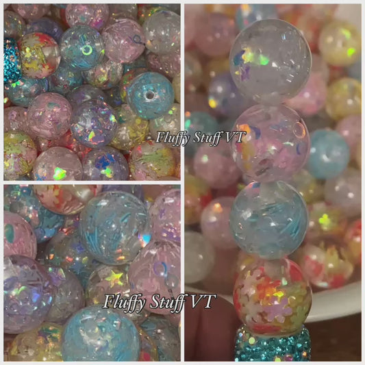 16 glitter filled resin bead